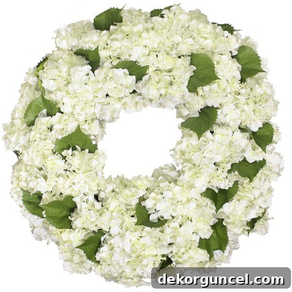 Top Spring Wreaths for a Welcoming Front Door 8 Gorgeous spring hydrangea wreath, one of the ten beautiful and recommended wreaths in this post.
