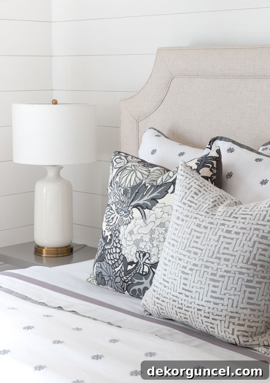 Adoring this gray crosshatch pillow, currently available at over half off, offering both style and significant savings!