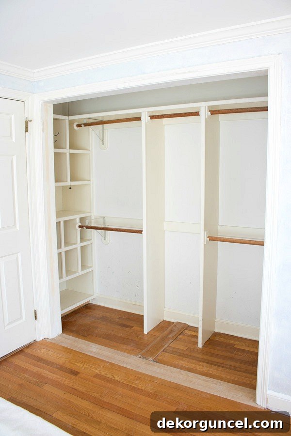 Closet opening after removal of bi-fold doors and central divider, showing a wide, unobstructed space.