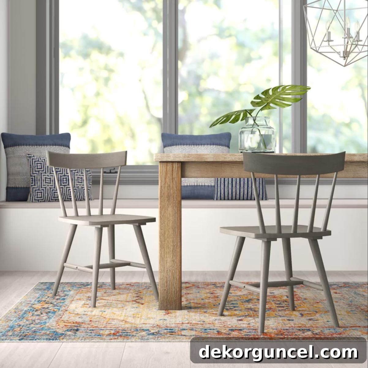 Elegant gray Windsor dining chairs with stylish low backs, perfect for modern and classic interiors
