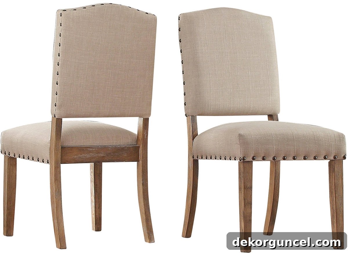 Affordable upholstered dining chair with elegant nailhead trim, adding a touch of luxury