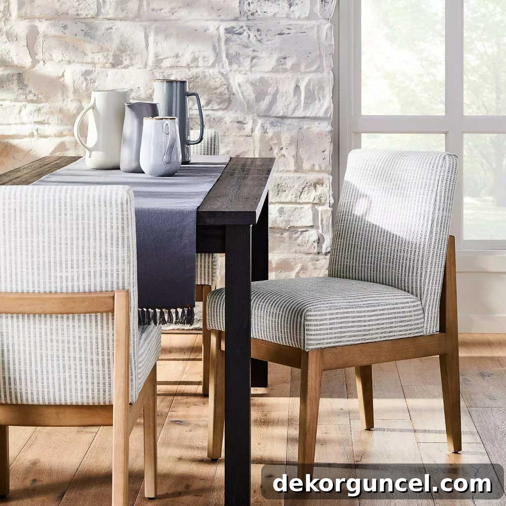 Elegant upholstered stripe dining chairs, combining comfort with modern design
