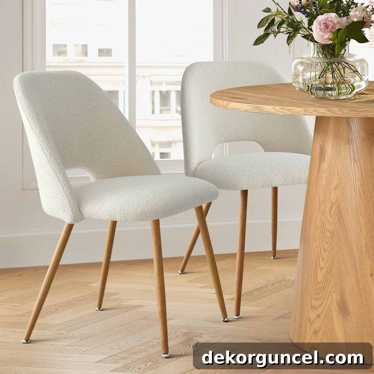 Modern fabric-wrapped chair with elegant dowel legs, showcasing a sleek design