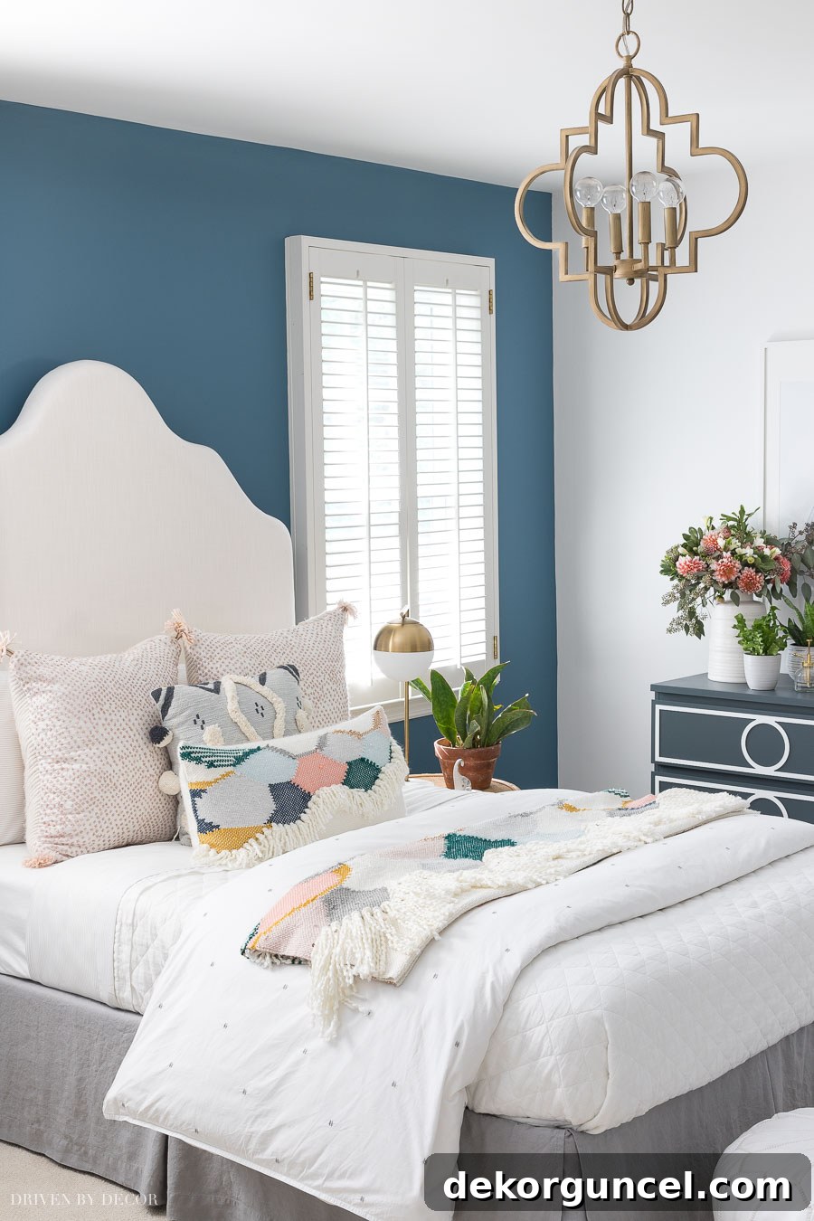 My Top 10 DIY Home Projects 13 A vibrant and stylish boho-chic teen bedroom featuring a custom DIY upholstered headboard, colorful bedding, and eclectic decor, showcasing a personalized and modern design.