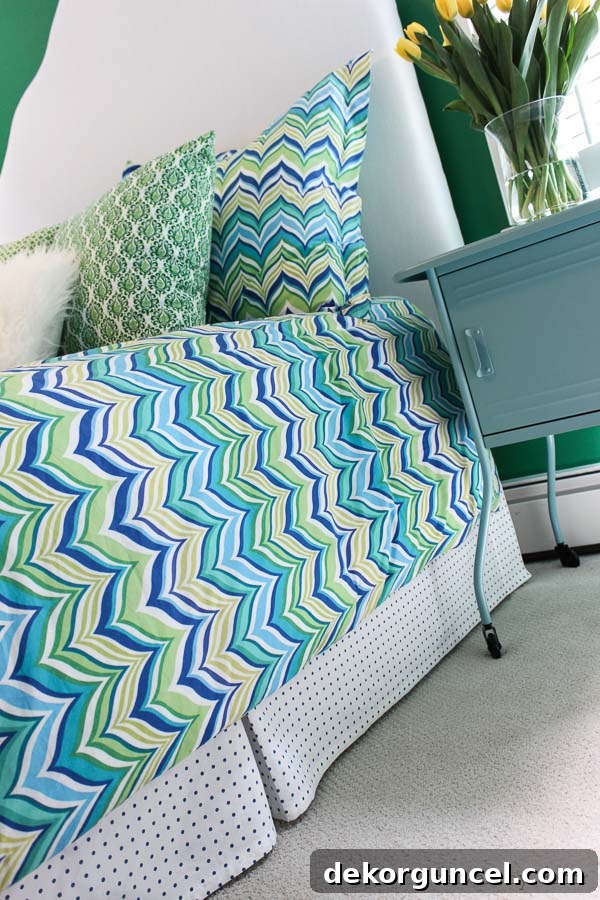 My Top 10 DIY Home Projects 7 A charming custom bed skirt made from a simple polka dot flat sheet, demonstrating an affordable and easy DIY solution for a perfect fit in a child's bedroom.