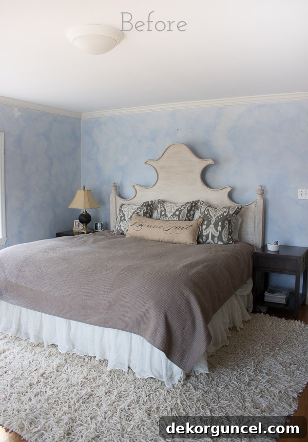 My Top 10 DIY Home Projects 9 Before image of a master bedroom featuring highly textured and cracked blue faux-finished plaster walls, highlighting the need for a significant wall treatment.