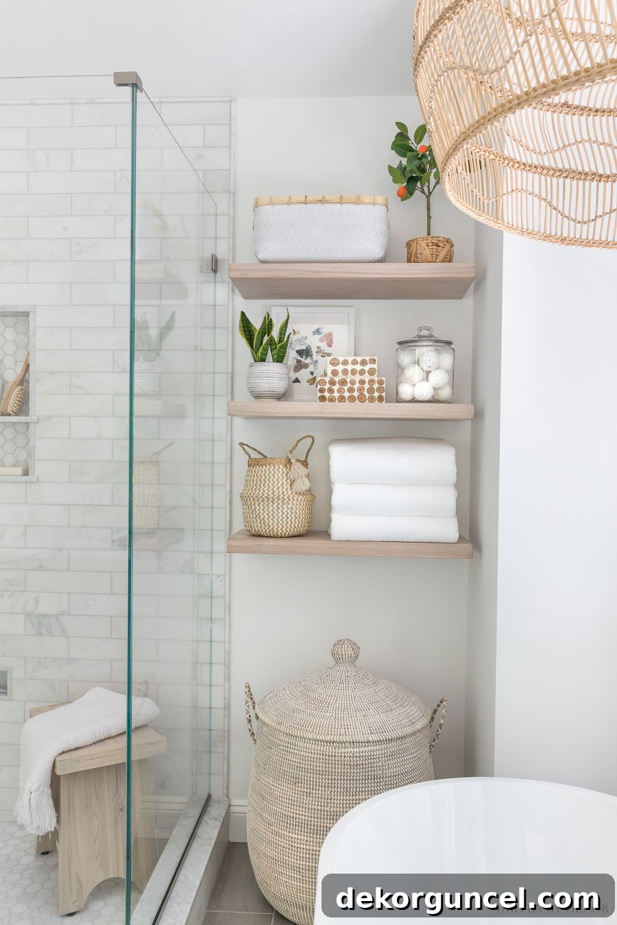 A stylish master bathroom featuring a large lidded woven basket, adding texture and serving as a chic hamper.