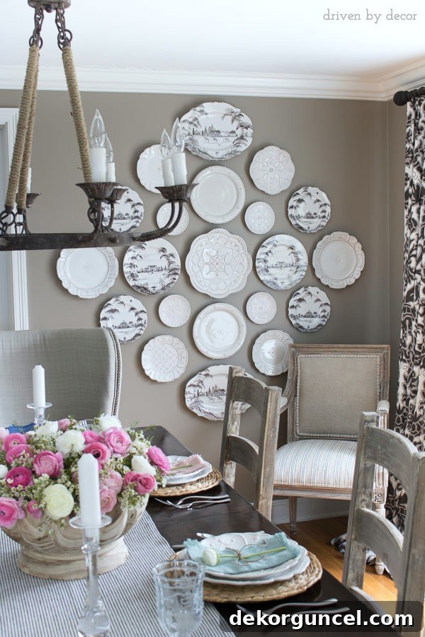 Unleash Your Inner Artist 5 Simple Projects 6 A stunning dining room with a neutral palette, highlighted by a statement-making plate wall. This creative decor idea adds elegance and charm!