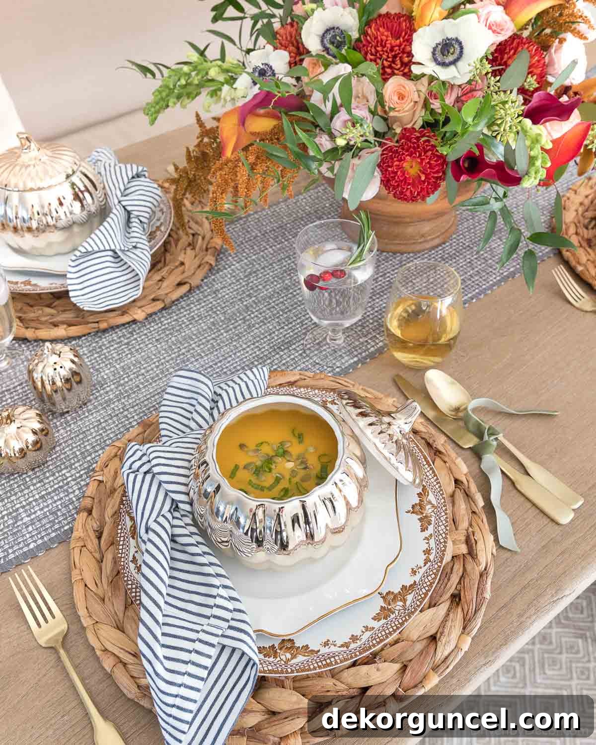 Napkin knotted on side of plate - an idea that could be used for Christmas table decor