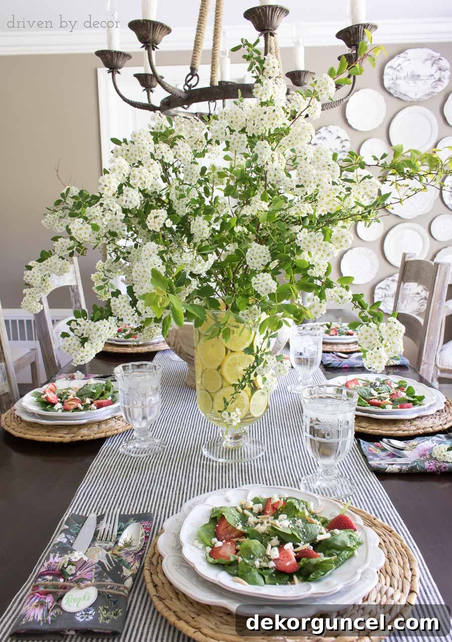 Slice lemons to line a vase for a beautiful, simple spring table centerpiece!