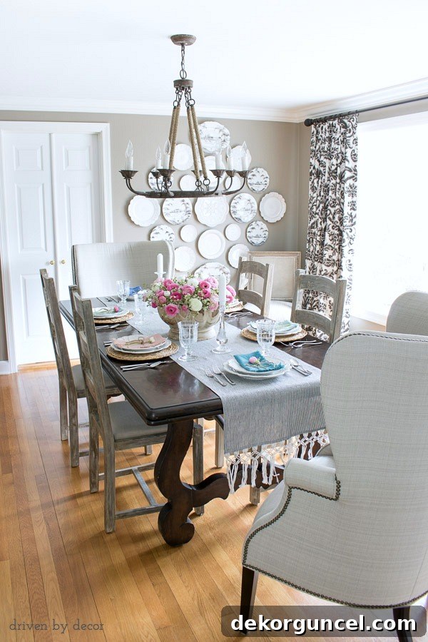 Window Treatments: Design Ideas and Expert Advice 4 Dining room in neutrals with ladderback side chairs, upholstered wingback end chairs, rope chandelier, and a statement-making plate wall!