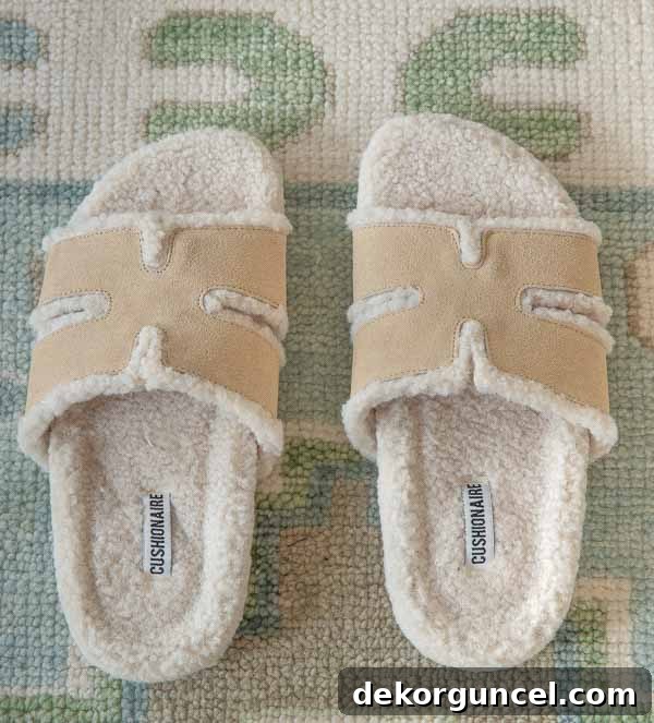 Cozy faux shearling slide sandals, offering both comfort and a stylish look.
