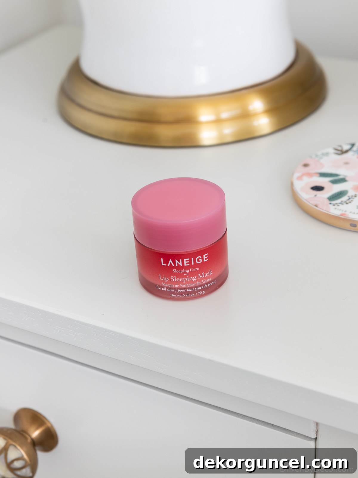 Laneige Lip Sleeping Mask in its iconic pink tub, promising overnight lip rejuvenation.