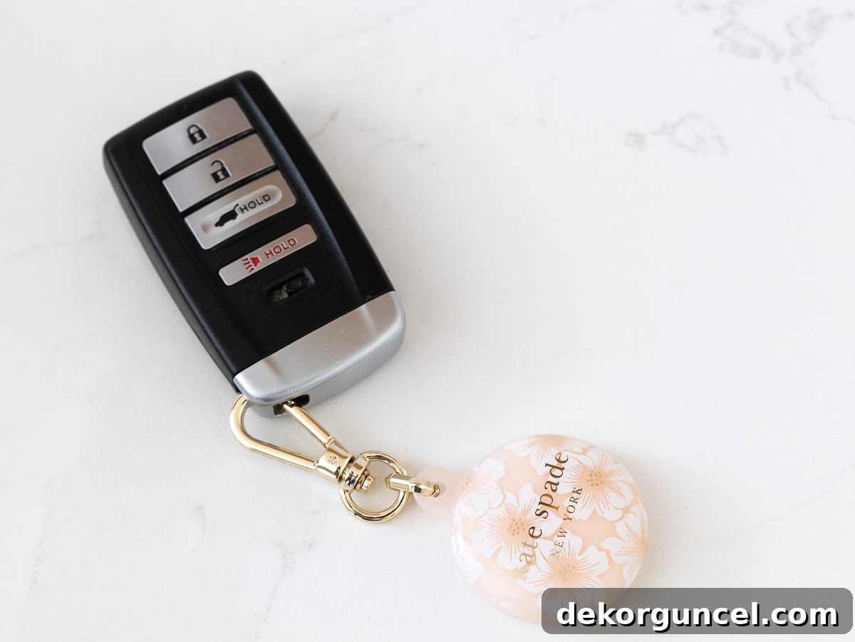 Stylish AirTag holder keychain, designed to secure an Apple AirTag.
