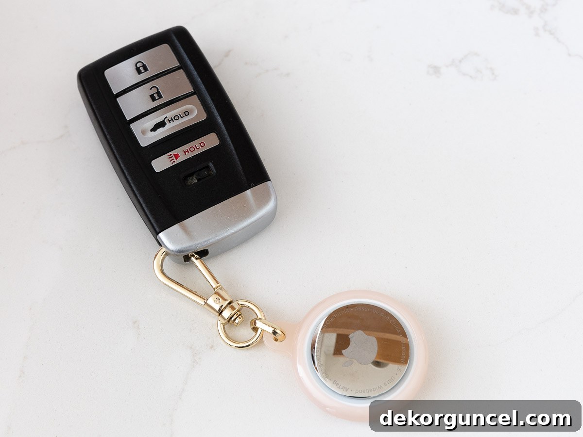 AirTag keychain attached to a set of keys, ready for tracking.