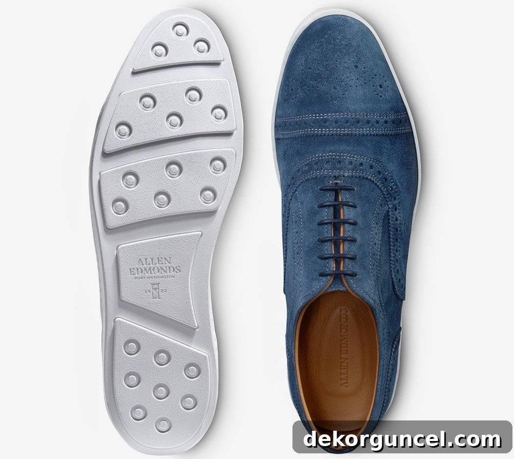 Stylish blue suede Oxford sneakers, a versatile footwear choice for any man.