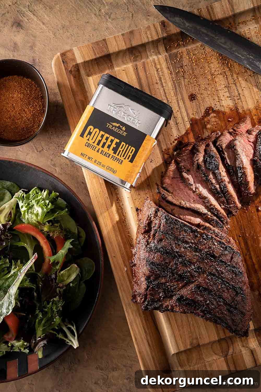 A jar of coffee and black pepper meat rub, perfect for enhancing grilled dishes.