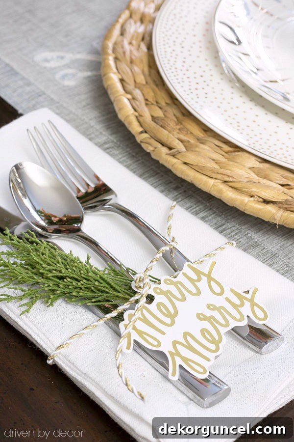 Holiday gift tags and a sprig of greenery adorn this simple Christmas placesetting