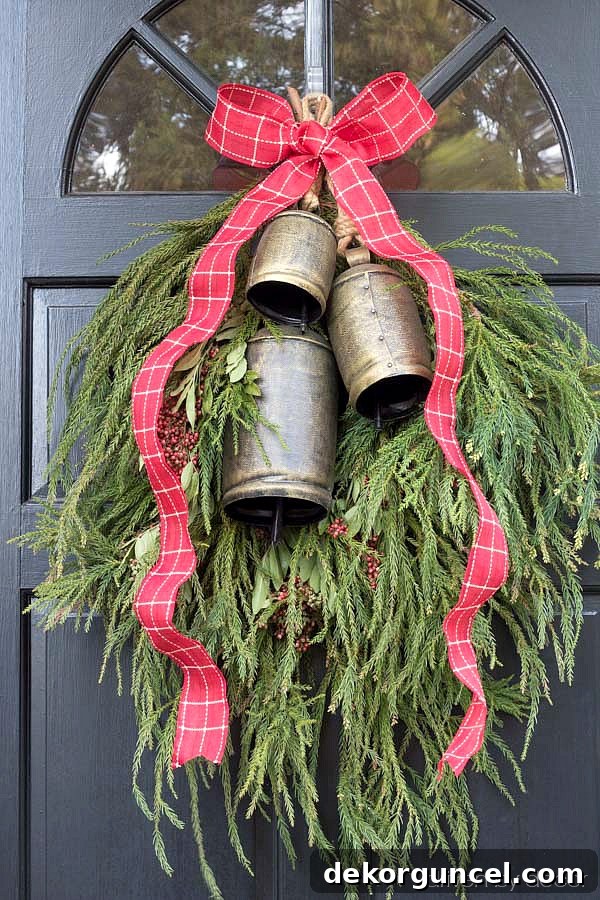Christmas home tour - simple DIY Christmas front door dec using greenery from your own backyard (post includes link to bells!)