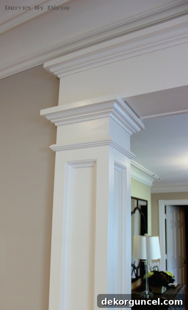 Our Foyer's Stunning Transformation 8 Close-up detail of beautifully crafted doorway molding, showcasing the intricate design and adding architectural interest to the family room