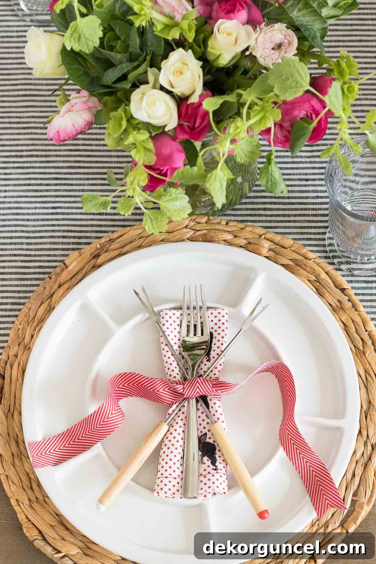 The Art of Fondue Table Presentation 4 Elegant plate setting with a woven charger and fondue forks, prepared for a gourmet fondue dinner