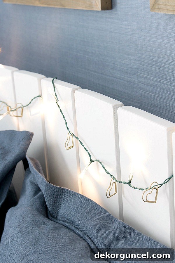 Gold paperclip hearts added to a strand of twinkle lights for a simple, sparkly Valentine's Day garland