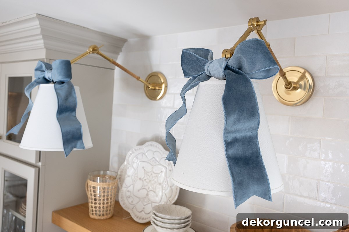 Sconces above coffee bar with light blue velvet bows