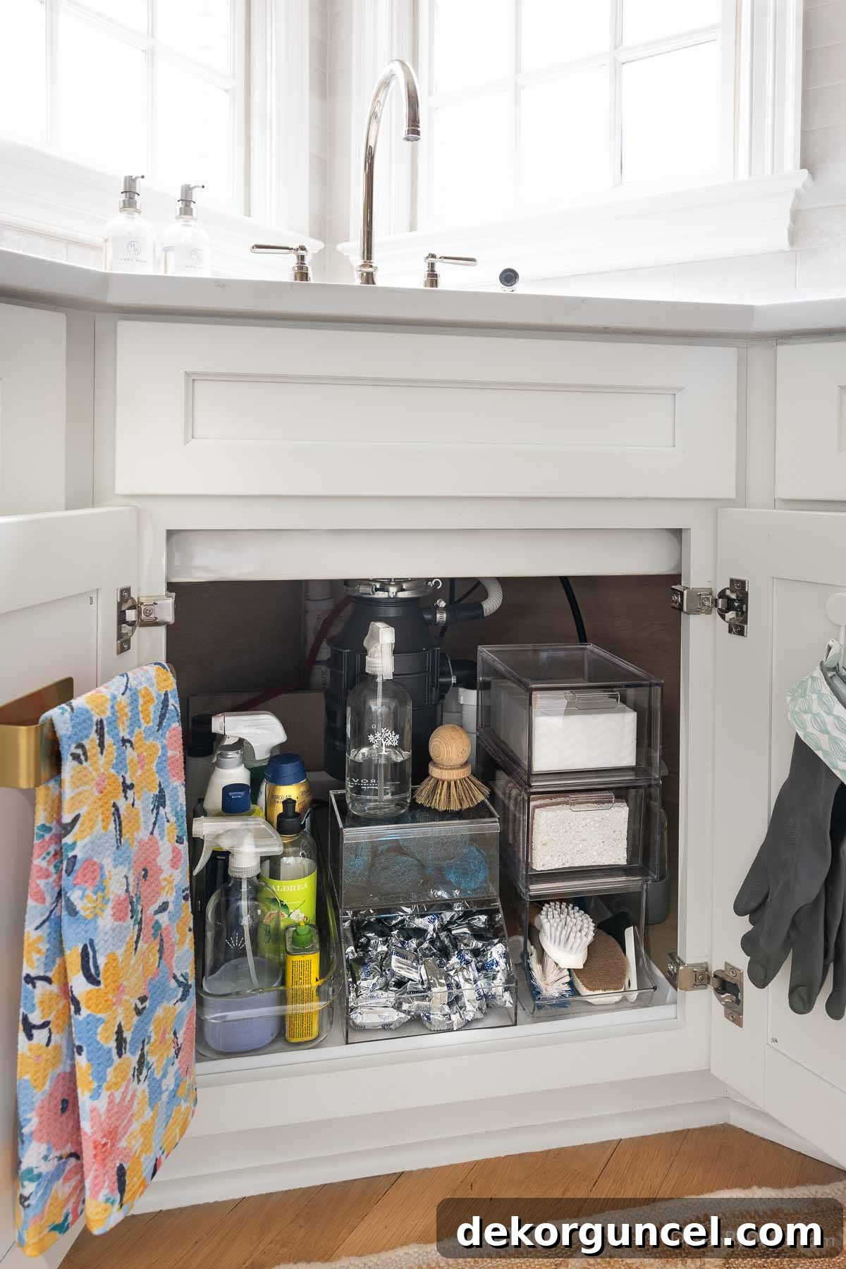 Organizing Under the Kitchen Sink: A Guide to a Tidy Space 22 Organized space under a corner kitchen sink.