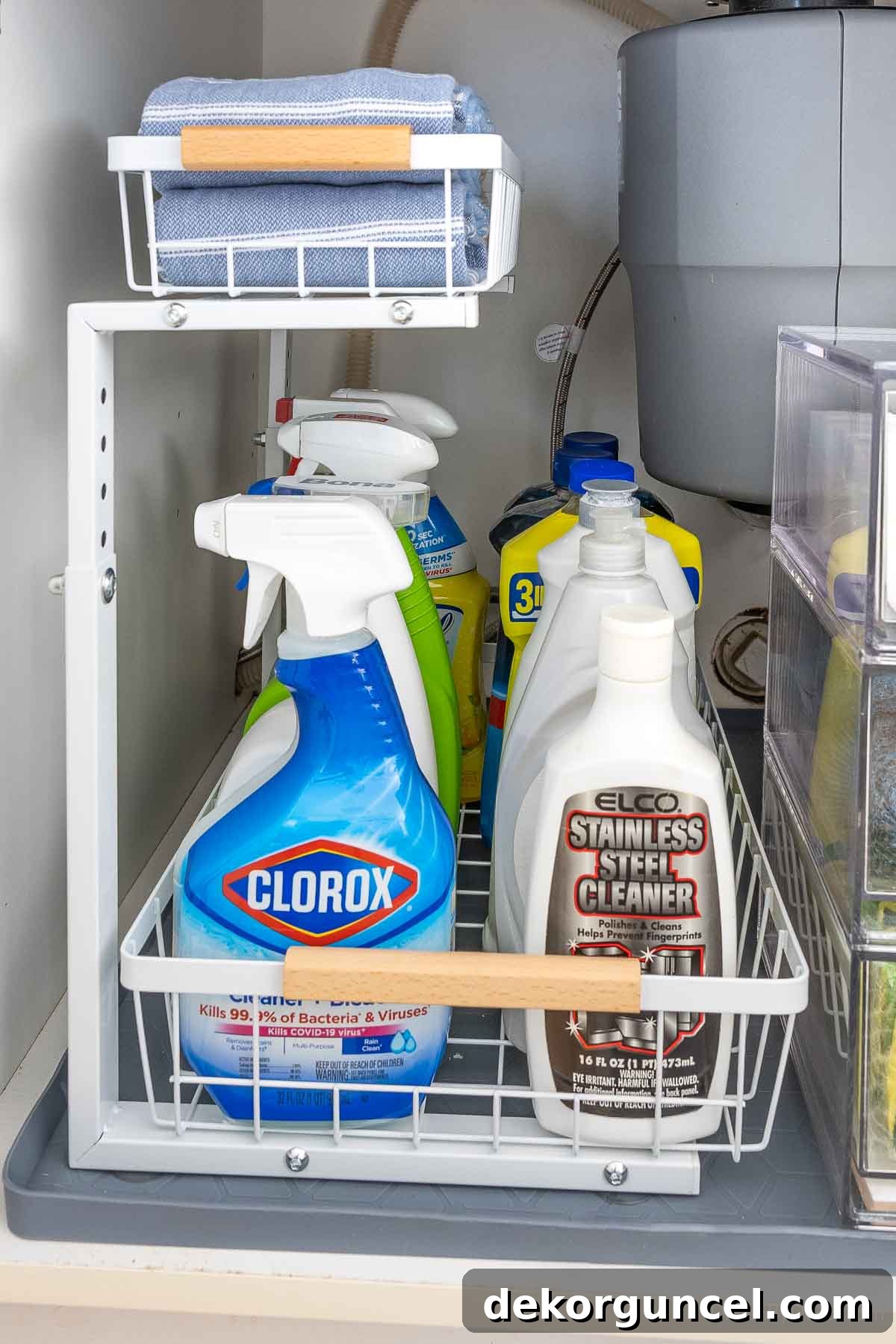Organizing Under the Kitchen Sink: A Guide to a Tidy Space 7 Tiered under-sink organizer for a kitchen sink cabinet.
