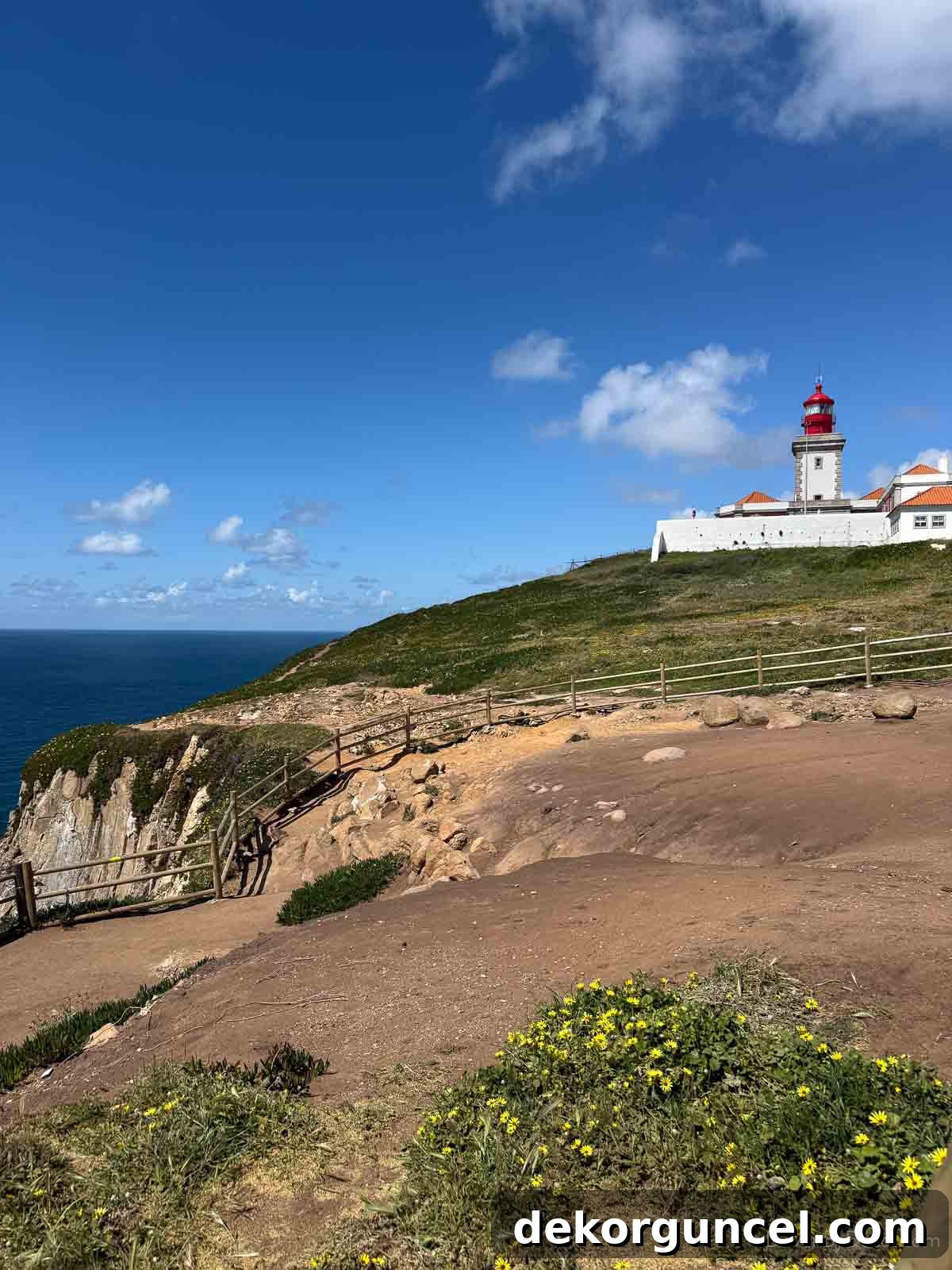 Family Trip to Portugal: Where We Stayed, Ate and Explored 20 Cabo da Roca lighthouse on coastline cliffs