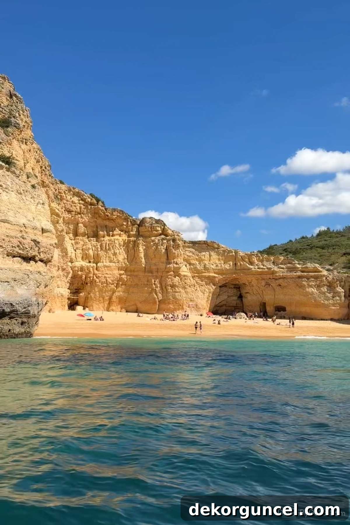 Family Trip to Portugal: Where We Stayed, Ate and Explored 23 The Algarve cliffs, beach, and water