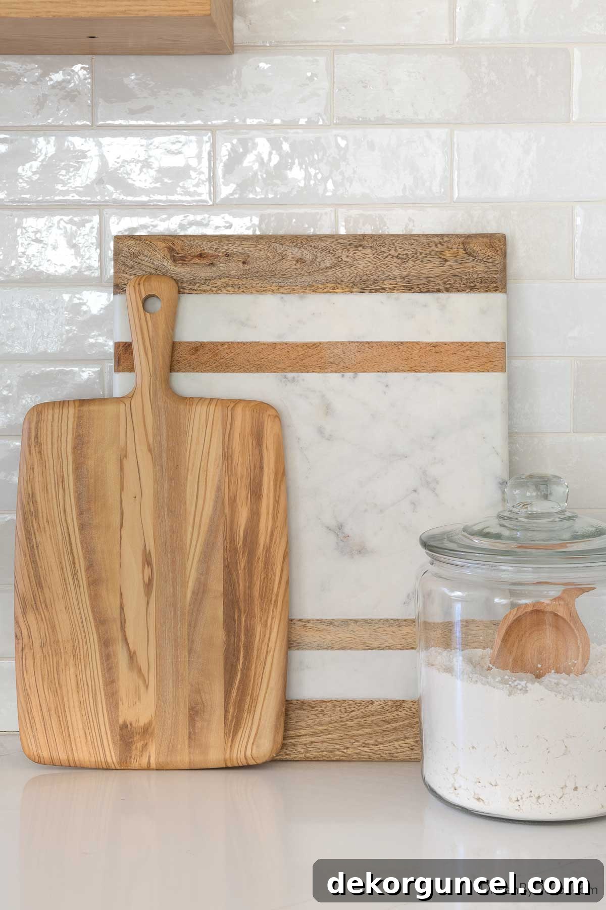 Small Budget, Big Impact: 50 Home Updates Under $50 10 Layered cutting boards on kitchen countertop